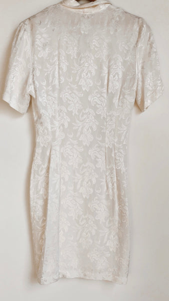 White silk power dress