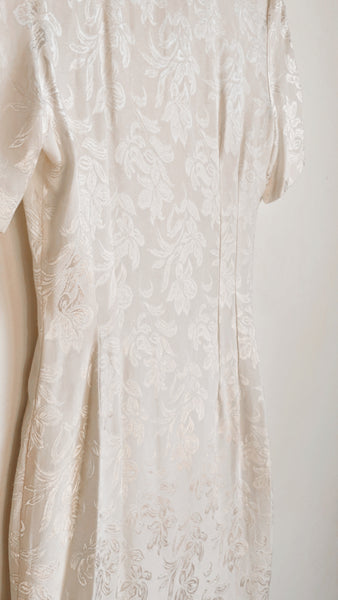White silk power dress