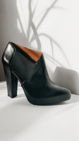 ‘Calvin Klein’ black leather boots 6